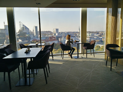 Hilton Tallinn Park Executive Lounge seating and view Hilton Tallinn Park Executive Lounge, tables and view