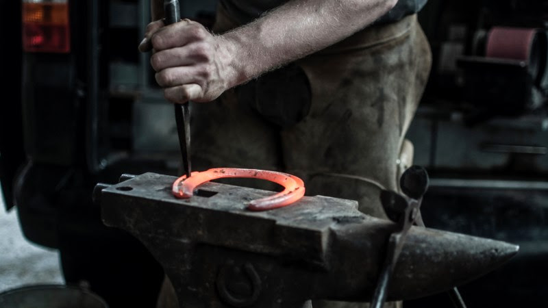 Blacksmith doing a Horseshoe