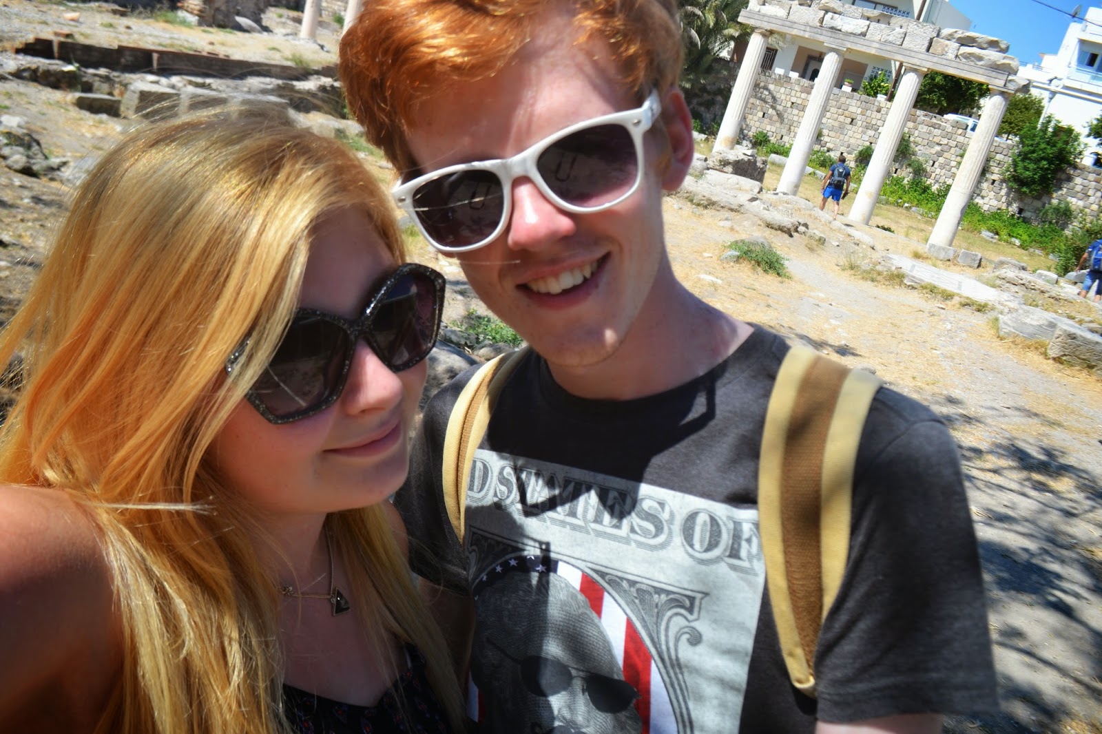 a selfie in front of green ruins in Kos Town