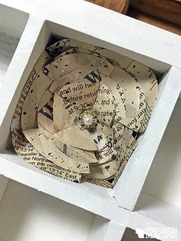 newspaper flower by Wisconsin Magpie milk-painted curio cabinet