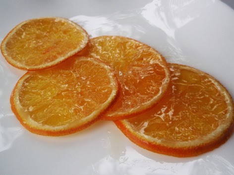rodajas de naranja confitadas