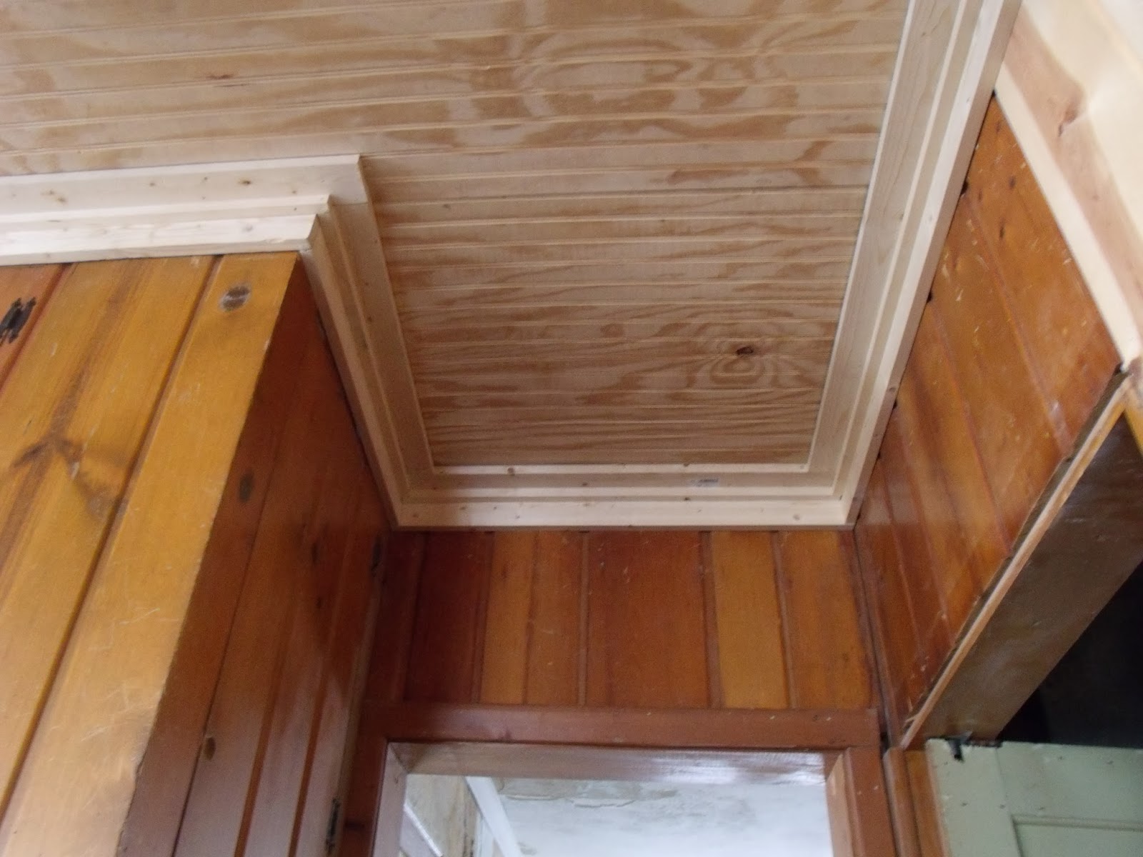 Gear Acres at Top of the Hill Ceiling trim and staircase update