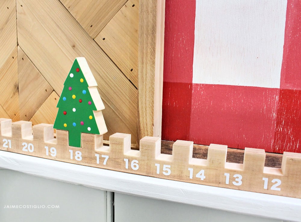 Wood Christmas countdown with moving tree