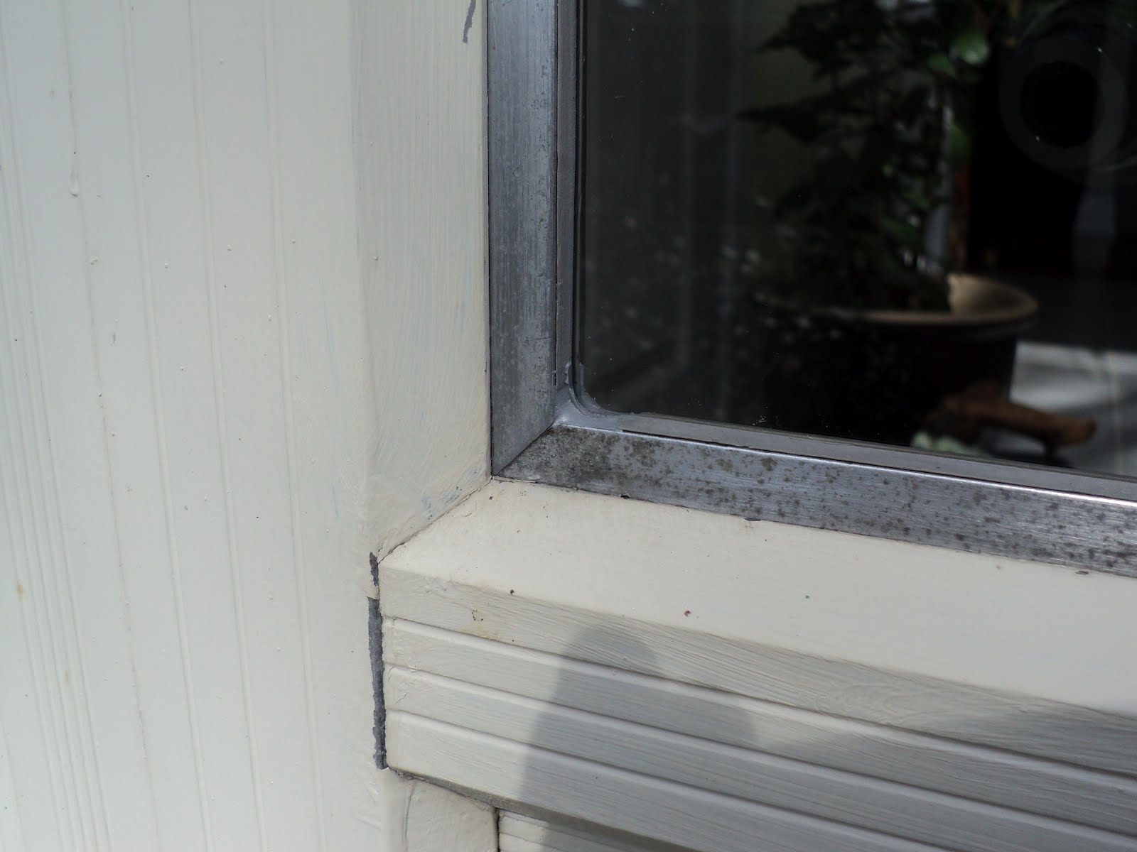 Rouge River Workshop: A Storm Door Broken Window Repair