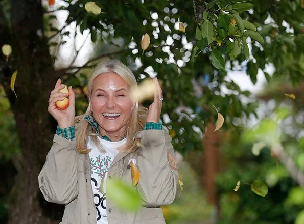 Crown Princess Mette-Marit of Norway visited a apple-picking project  'Lif Laga' at the Høybråten Sports Park in Oslo