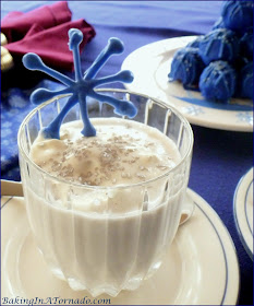 Holiday Snowflake Cocktail, a thick vanilla milkshake spiked with holiday cheer | Recipe developed by www.BakingInATornado.com | #recipe #holiday #cocktail