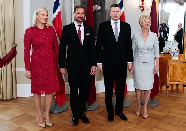 Crown Princess Mette Marit wore Valentino Lace Coat for visit to Latvia. President of Latvia, Raimonds Vējonis and First Lady Iveta Vējone