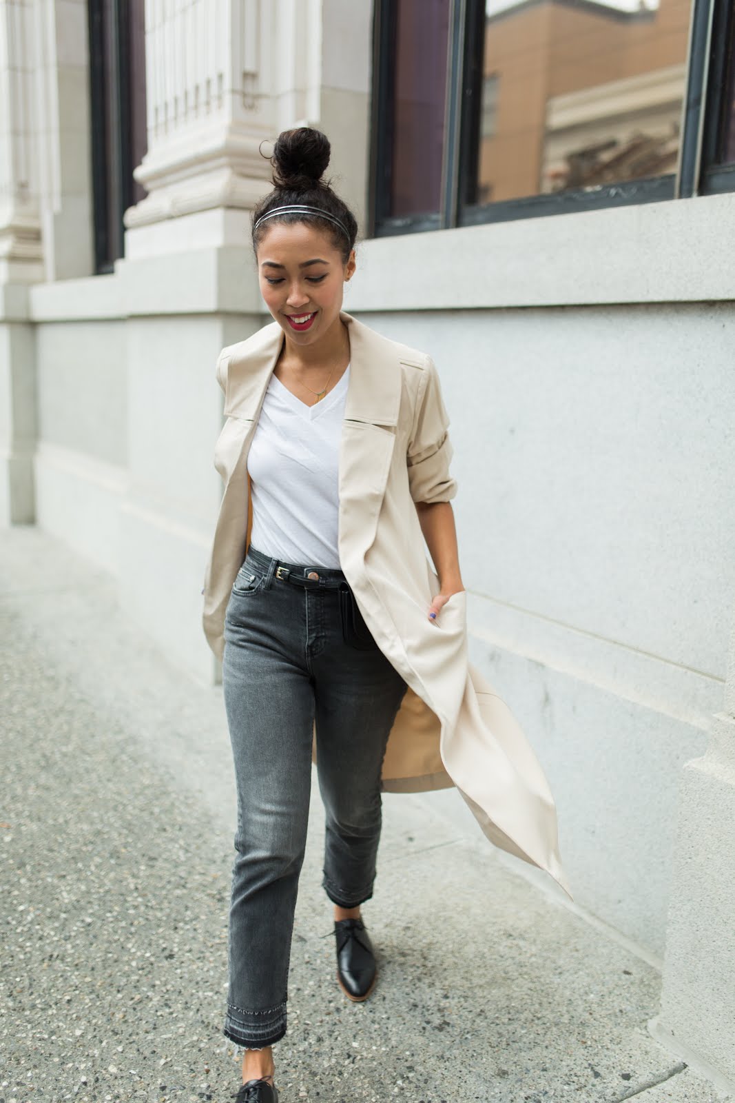 pancake stacker pancake stacker wearing a Two Feathers trench coat, River Island straight leg jeans; Everlane black oxfords, a white tee, and a Zara fanny.