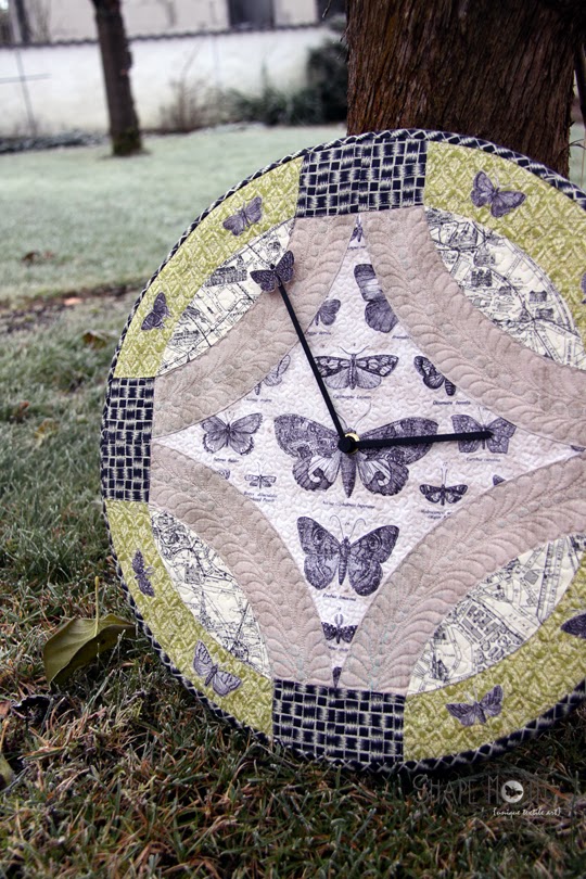 Shape Moth DWR Wall Clock