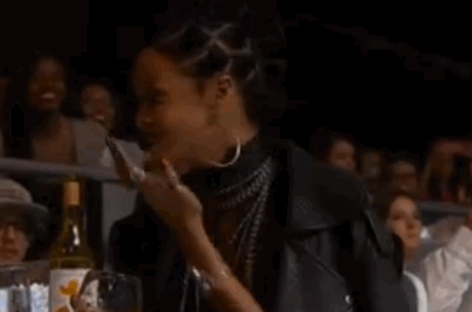 rihanna-laughing-at-ariana-grande.gif