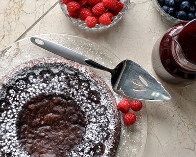 Chocolate Decadence Cake with Fresh Raspberries, the ultimate chocolate experience, a dense, moist, ultra-rich almost-flourless chocolate cake | Kitchen Parade