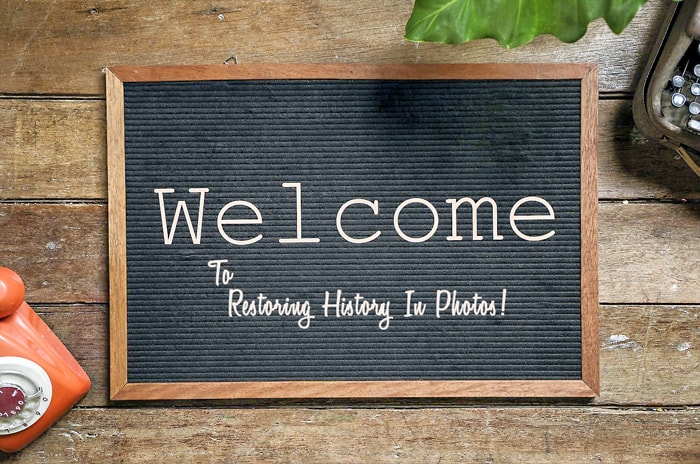 Welcome image for Restoring History In Photos first post on their website. Desktop mockup image showing a welcome board for Restoring History In Photos website.