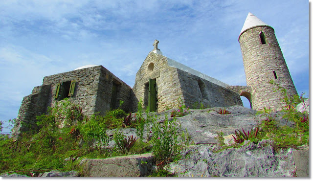 View of small stone hermitage, sporting a three story stone turret.