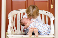 Brothers A big brother holding his baby brother.