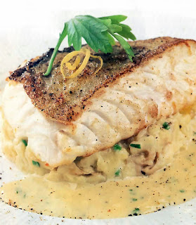 Crispy pan-fried cod served on a base of crushed potatoes with a lemon and parsley sauce