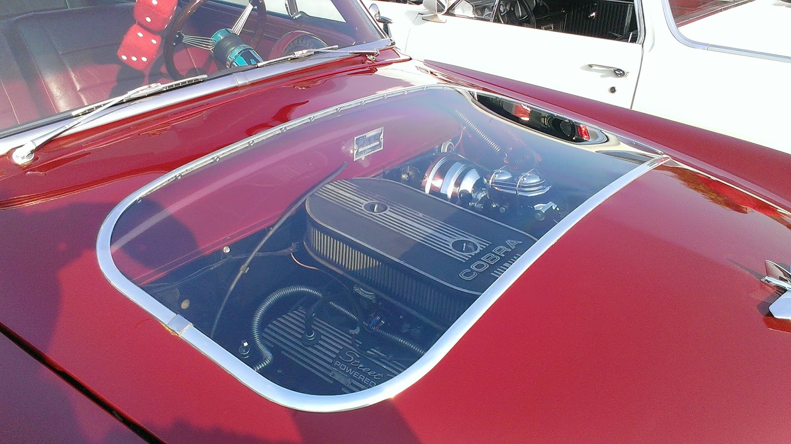 Just A Car Guy showroomonly cars were given special hoods with clear