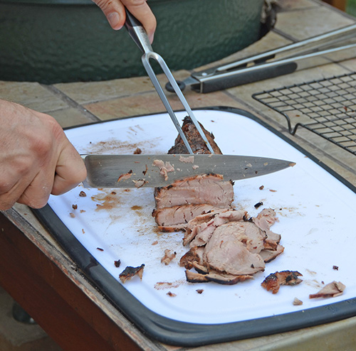 Thin slicing grilled pork tenderloin