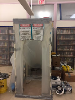 Asbestos Remediation Enclosure Plastic Enclosure with warning signs