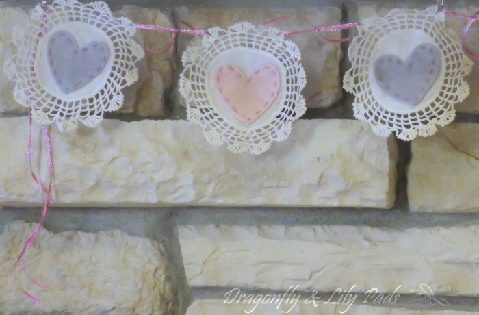 Doily and Felt Valentine's Garland made with the Cricut Valentine's Project group.