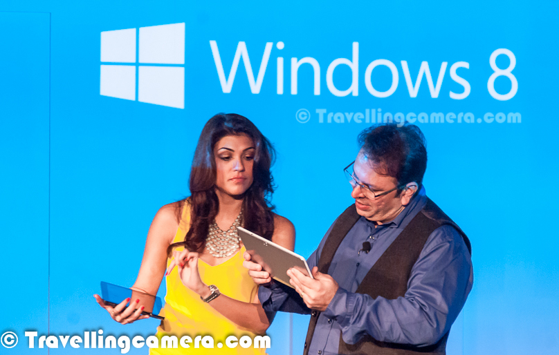 Last night Microsoft launched Windows8 in India and in various parts of the world. Travellingcamera team was also their to witness the launch buzz with some of the known faces from Bollywood including Madira Bedi, Archana Vijaya, Gaurav Kapoor and Roshan Abbas. Let's check out this Photo Journey and know more about this great event !!!I reached late at Oberoi Hotel which is on Zakir Hussain Marg in Delhi. But event had not yet started. People were having some tea/coffee & snacks. I noticed Mandira talking to some of the Microsoft folks out there. Whole space was full of Black suite people and there were hardly few folks in casuals. It was good to see myself dressed up appropriately to stand out in the crowd :). Some of the fellow bloggers were already there in the hall and they shared more details about other faces like Archana Vijaya, Gaurav Kapoor and Roshan Abbas. Around the main conference hall, there were four beautiful stalls for each of them, although I was not sure if something would happen there or not.Gaurav Kapoor had a special stall for young crowd and was sharing some of the cool features of Windows8 which can be interesting or useful for young people. If I mention more clearly, this whole talk was about Metro applications and not not really Windows8. Since Windows8 provides the basic infrastructure for all these Metro Application, idea was to make people aware about new experiences Windows8 can offer. There were curtains around the stall, so some of us were wondering if he is showing some special stuff to selected set of youngsters.Whole evening was quite enjoyable with very well organized things w.r.t. timings, space utilization, mix of fun & knowledge etc.Roshan Abbas talking to Ajay Sood and some of the folks from Microsoft. He was having a stall where he was showcasing Metro applications to increase productivitof a particular business. This one was too crowded with same set of people for a longer period of time, so we simply skipped and clicked this Photograph to at least share that he was also there :)Gaurav Kapoor had great role in the event. He was there on stage for longer period of time with one of the Microsoft person. They were sort of sharing various features of Windows8 in form of a play. Pretty confident personality with great sense of humor. I am sure that lot of efforts must have gone to make this whole show successful. I was amazed to see these bollywood folks responding to Windows8 questions, which shows that they had gone through great training about this Operating System or they were using it for quite some timeArchana Vijaya was there to talk more around her passion - Travel. She was emphasizing on the fact about the possibilities to make life lot easier while travelling with Windows8 enabled devise. Also she was sharing about some of the cool Travel Metro Applications to plan your trips within or outside the country. She sounded most passionate about the things she was sharing with people at Windows8 Launch PartyHe sounded like an avid Traveller, who has travelled to various parts of the world and care much about her travelling plans. We could notice lot of energy around her stall. She was also conducting some Travel QuizesEvent started with brief introduction about Windows8 by Microsoft India Marketing head and then handed over of Windows8 professionals to talk about the their new Operating System in detail.  Microsoft folks presented Windows8 very well in front of audience present and everyone was amazed by the experience. Here I don't to emphasize on technical details of Windows8, so if you can't wait for next post on this blog, just check out following link to know about Windows8 by Microsoft - http://windows.microsoft.com/en-IN/windows-8/meeAfter all presentations, some demoes by Madira Bedi, Archana Vijaya, Gaurav Kapoor and Roshan Abbas ; there was a quick break for drinks & snacks and various performances started to keep the environment alive. Drinks were on during these performancesAt top level, Windows8 looked quite different from all earlier versions of Windows by Microsoft. First view of operating system is quite vibrant with easy to use interface with colorful tiles. Whole venue at Oberoi Hotel had colorful cubes to sit and even drinks had shining colorful cubes. Whole event was ccreatively planned by keeping Windows8 delicacies in minMandira had kitchen kind of setup where she was mainly talking about Metro Appliactions for Cooking & Cricket. Many times she talked about her son and how Windows8 can add lot of value in her own lifestyle. She also shared about some interesting exercise applicationsCharms in Windows8 was another thing which was coming again and again. A short act by Gaurav Kappor and a Microsoft employee tried to explain it in better wayIn Windows8, even the little things are all about you. Like the screen that appears when your PC is locked—it can be any picture you choose. And you will see quick notifications on your lock screen before you sign in to your PC or open a single app. With picture password, you can sign in by tracing a pattern on a picture of your choice instead of typing a password. It's all about mutiple choices you have now.Keep looking this place for detailed information about Windows8 Operating System. This post only talks about the launch event instead of Windows8. 