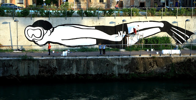 Italian Street Artist MP5 Paints a new mural entitled "Playing Upstream" in Terni, Italy. 8