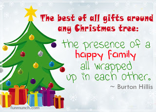 The best of all gifts around any Christmas tree: the presence of a happy family all wrapped up in each other.