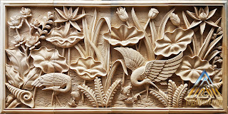 Relief burung bangau dan bunga lotus Relief burung bangau dan bunga lotus dibuat dari batu alam paras jogja atau batu paras putih