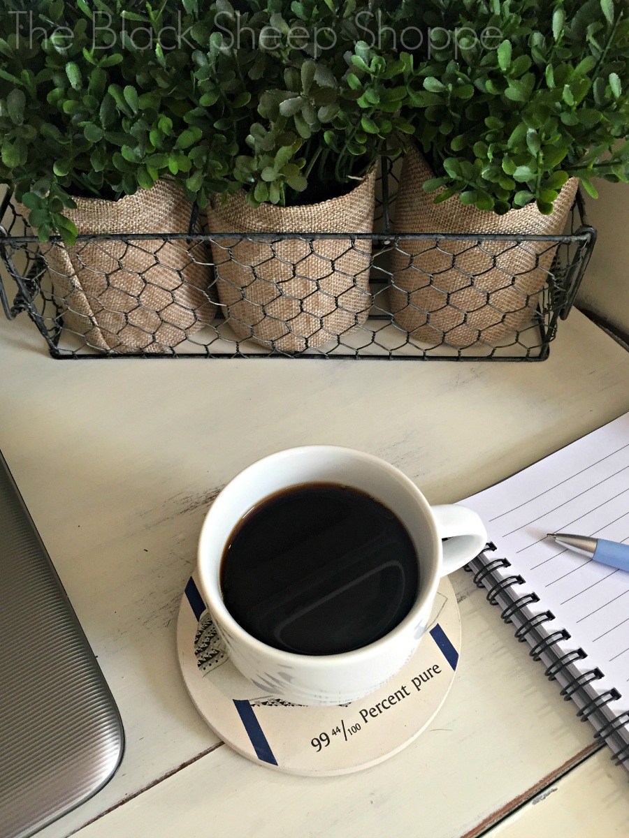 Cup of coffee on painted secretary desk Cup of coffee on painted secretary desk