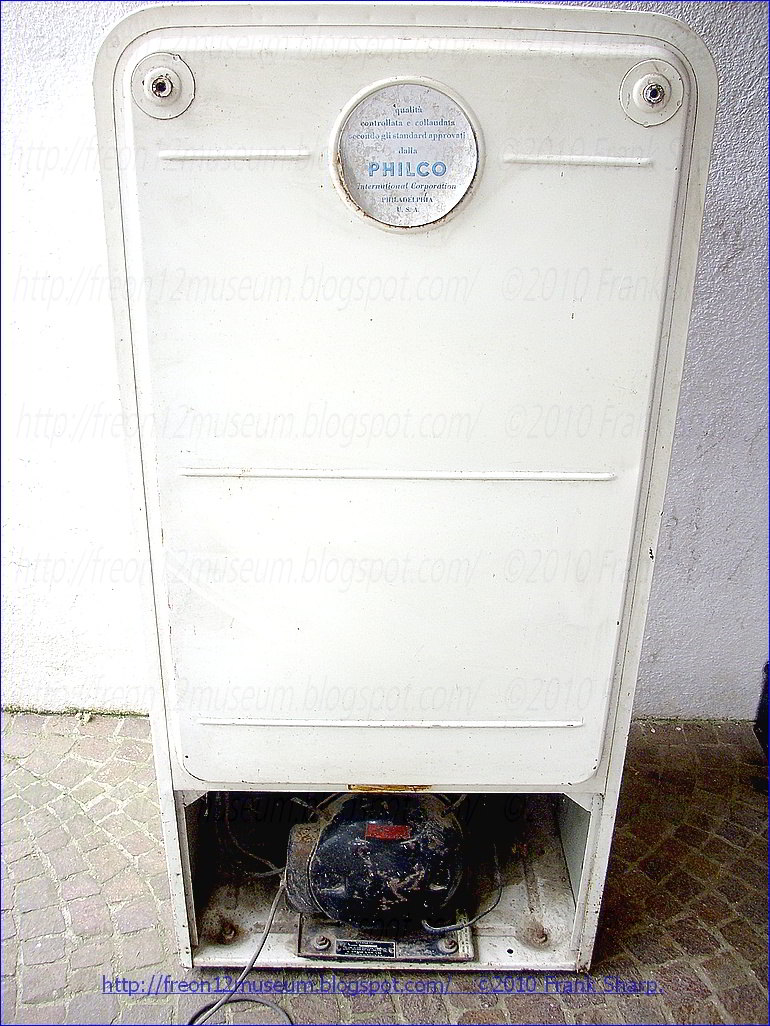Refrigeration apparatus comprising a pair of spaced supporting columns adapted to be posi- tioned in a vertical position, a hermetic com-