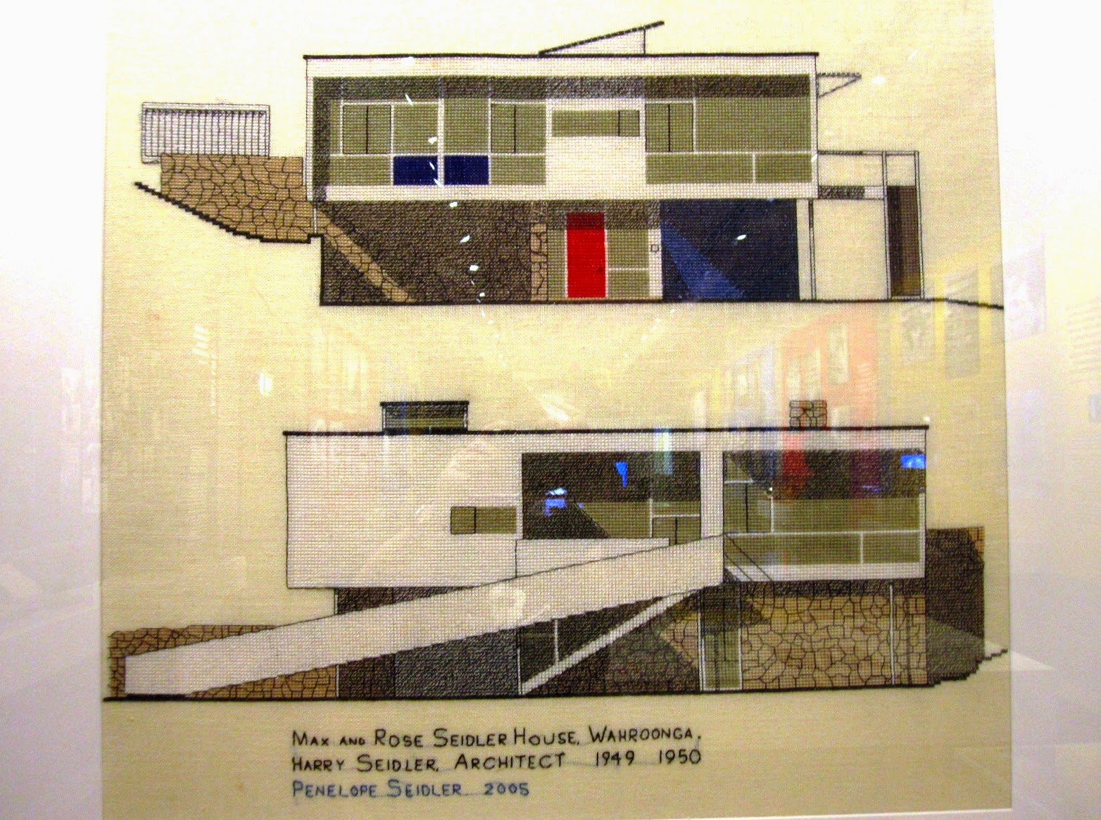 Cross-stitch picture of Rose Seidler House.