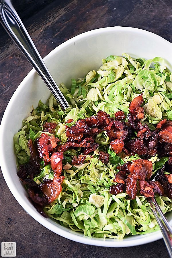 Topping shredded Brussels sprouts with bacon dressing