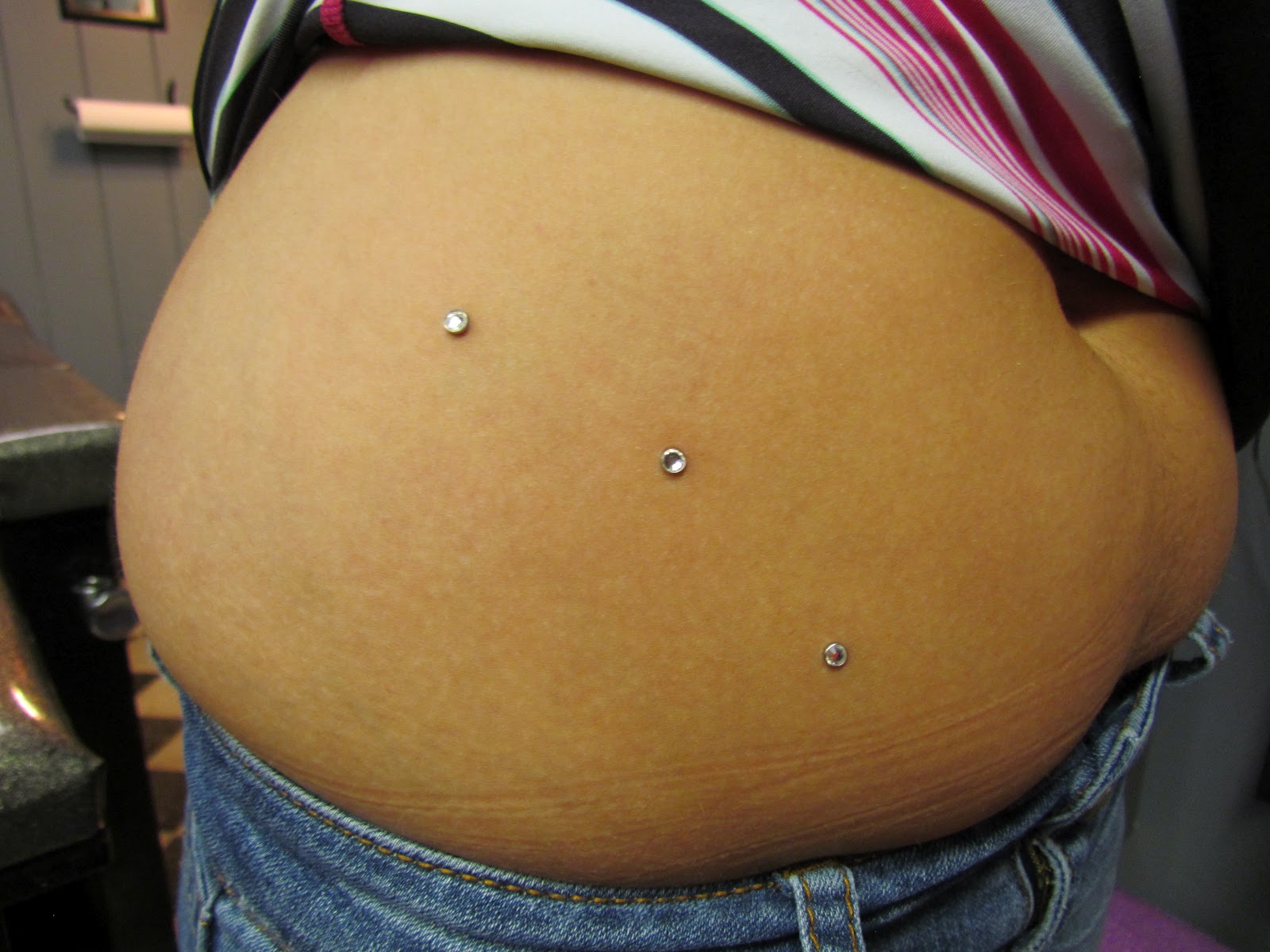 Ass crack piercing