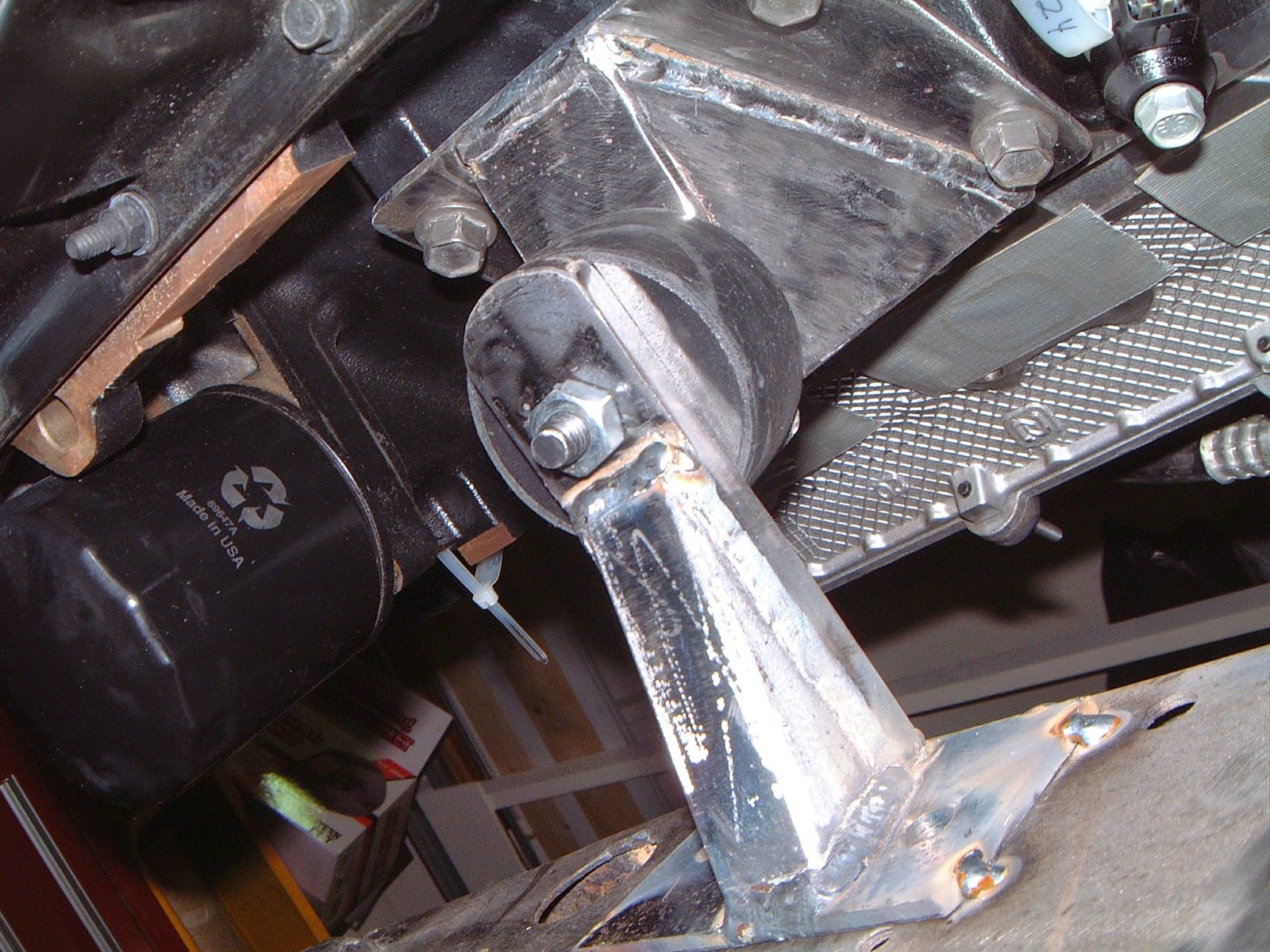 1937 Plymouth Motor mount fabrication. The mounts on the frame were