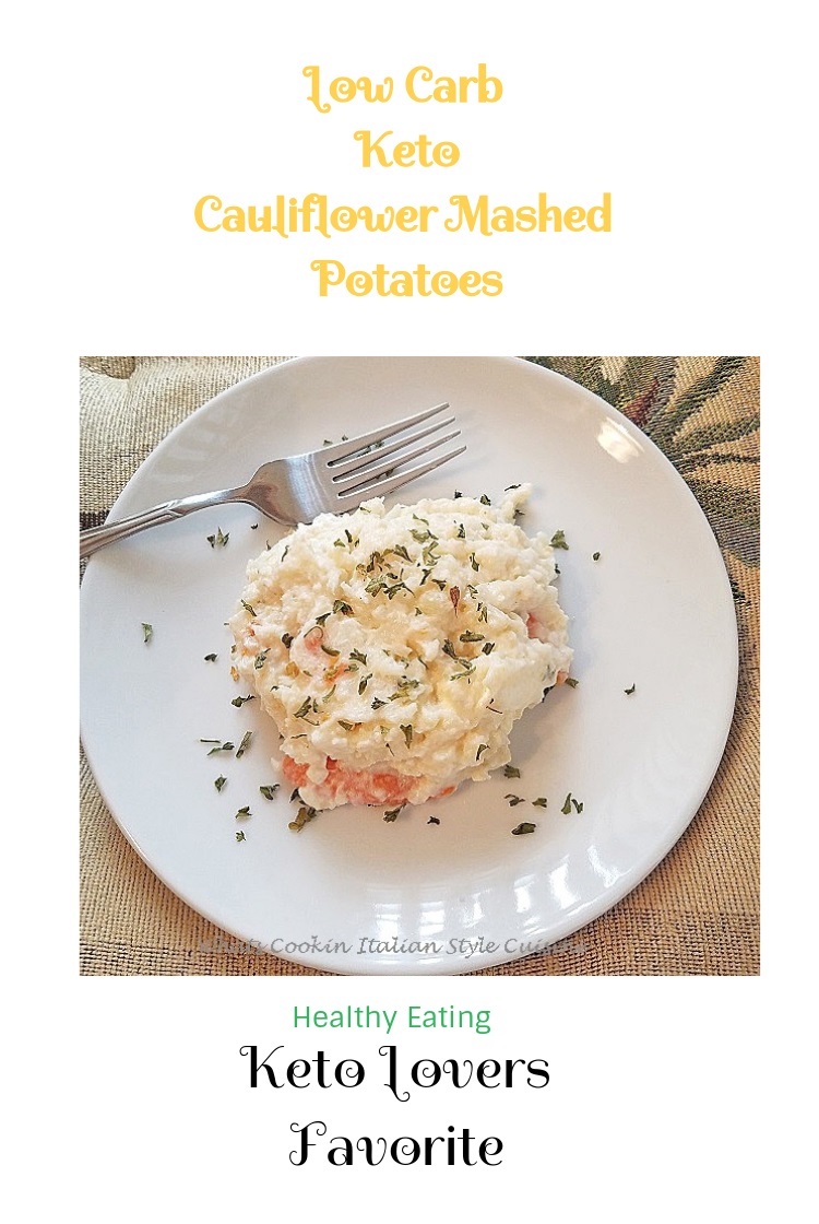 this is  smashed or mashed  together cauliflower and carrots mashed potatoes with sour cream and butter in keto low carb preparation. these low carb keto cauliflower mashed potatoes take the place of regular potatoes and copycat version of mashed potatoes. This is a Keto and Low Carb Recipe