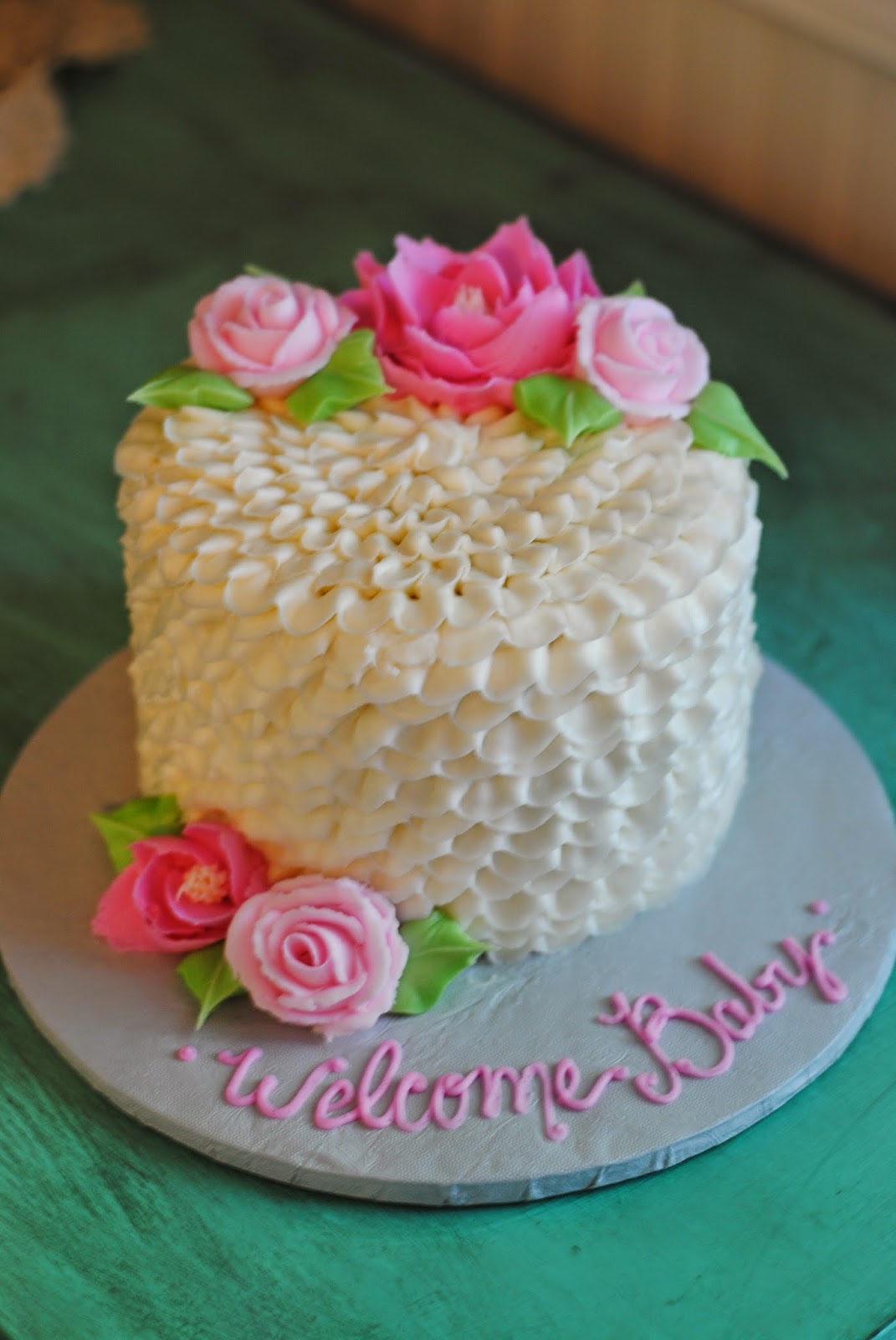 Country Cupboard Cakes Pink Flower and ruffle baby shower cake