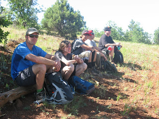 group resting on trail