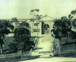 The front of the prison in the late 19th century. The  alleged graves referred to above were said to be to the  left of the driveway under the trees