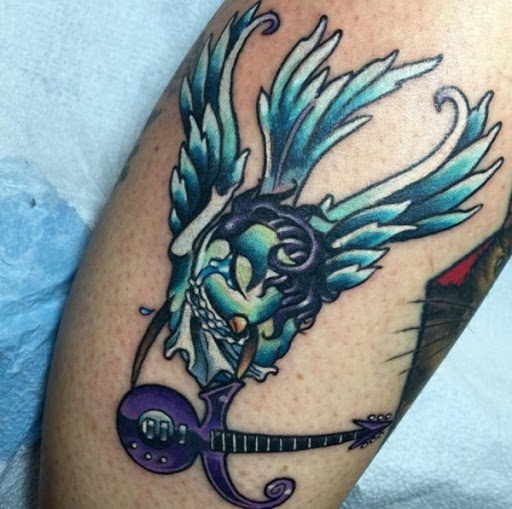 Pomba, o Príncipe e a Guitarra de Tatuagem