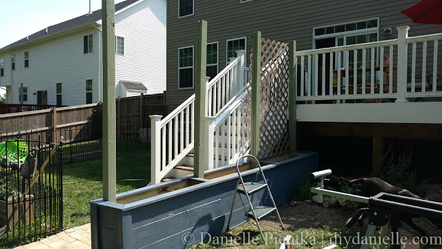 Trim added around the privacy planters. Painted. Painted privacy planters with trim.