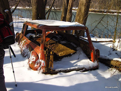 Old car left next to Wabash river