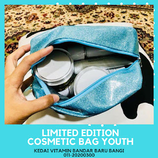 YOUTH Blue Shimmer Cosmetic Case.