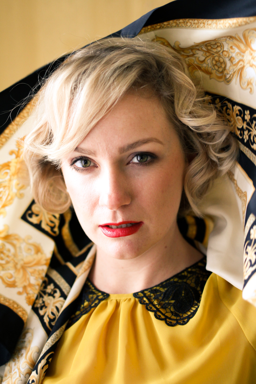 @findingfemme in yellow blouse with black lace collar, black Review Australia skirt, black bow heels and classic scarf.