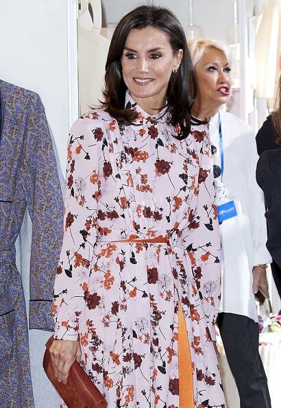 Queen Letizia wore a new floral print midi shirtdress by Hugo Boss at charity market Rastrillo Nuevo Futuro. Queen Sofia