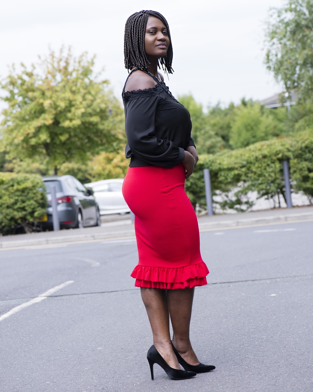 CURVES IN OFF-THE-SHOULDER AND RUFFLE HEM SKIRT...