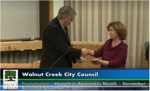 Trinity Center Director Donna Colombo receives an award from the Walnut Creek City Council Trinity Center Director Donna Colombo