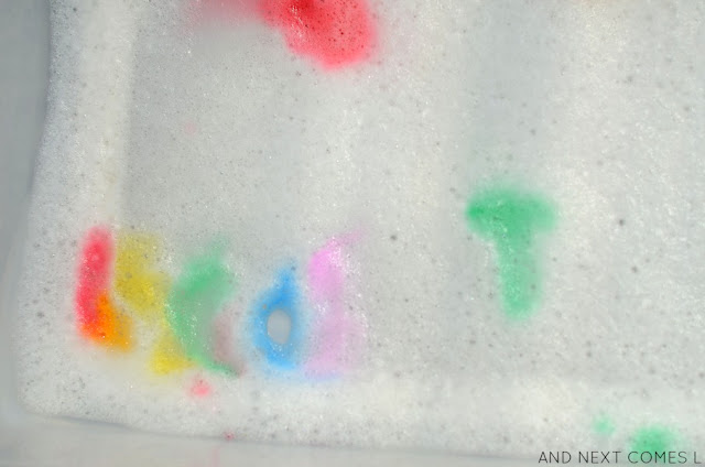 Colorful soap foam sensory activity for kids from And Next Comes L
