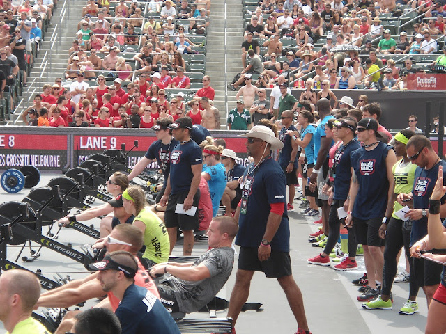 Image of team competitors rowing on Concept 2 rowers during competition at the 2012 CrossFit Games