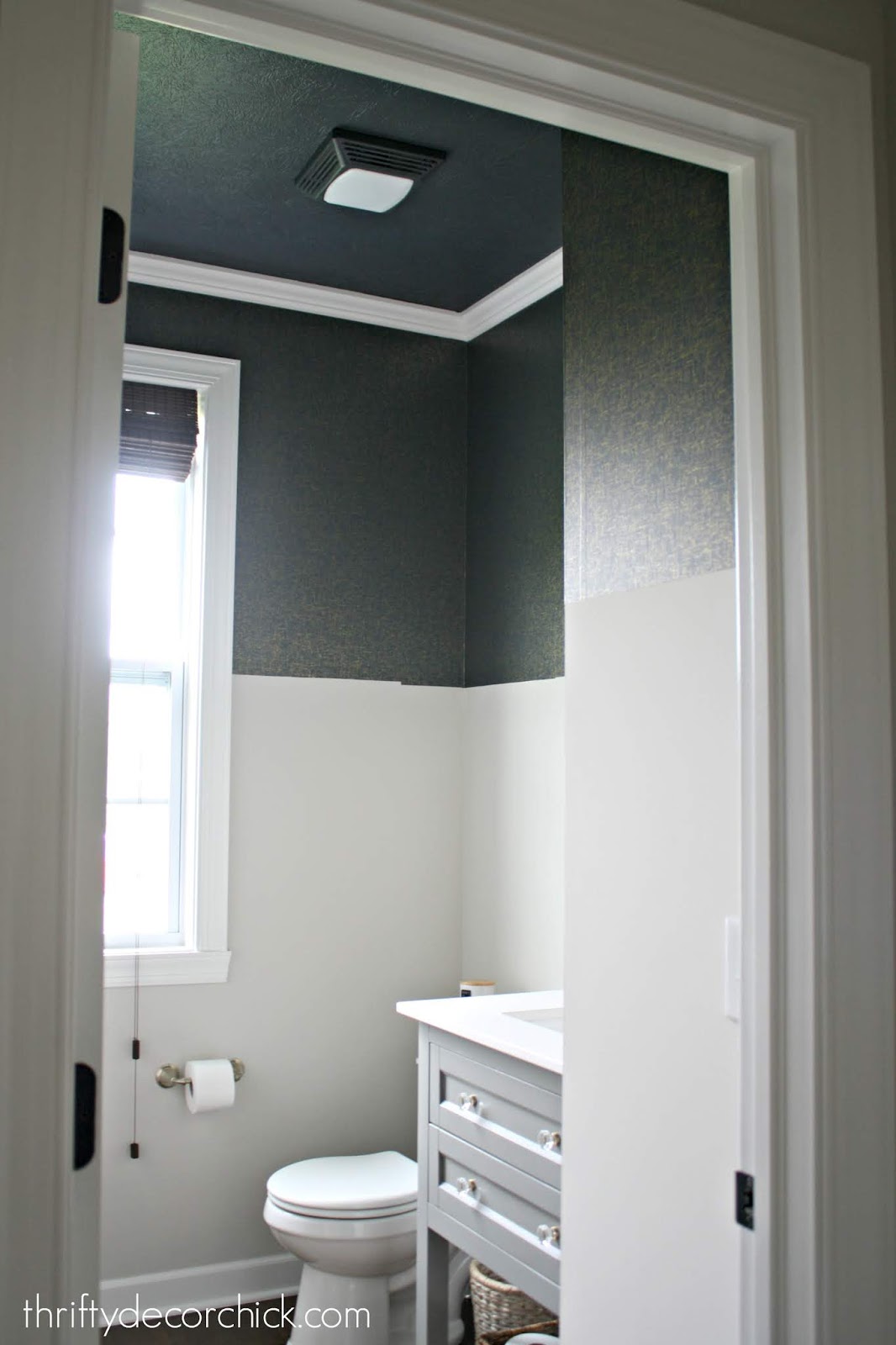 Dark painted ceiling in bathroom