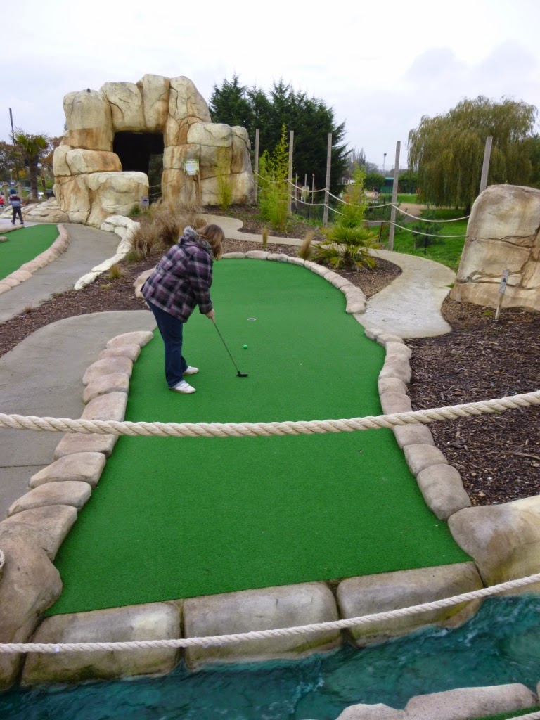 Helen 'Hells Bells' Dodd easily handling a water hazard hole at the Jungle Island Adventure Golf course in Epsom Helen 'Hells Bells' Dodd easily handling a water hazard hole at the Jungle Island Adventure Golf course in Epsom
