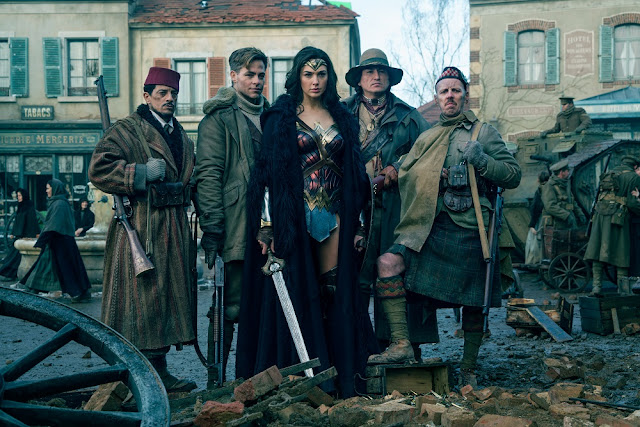 (L-R) SAÏD TAGHMAOUI as Sameer, CHRIS PINE as Steve Trevor, GAL GADOT as Diana, EUGENE BRAVE ROCK as The Chief and EWEN BREMNER as Charlie in the action adventure "WONDER WOMAN," a Warner Bros. Pictures release. wonder woman chris pine group photo world war 2